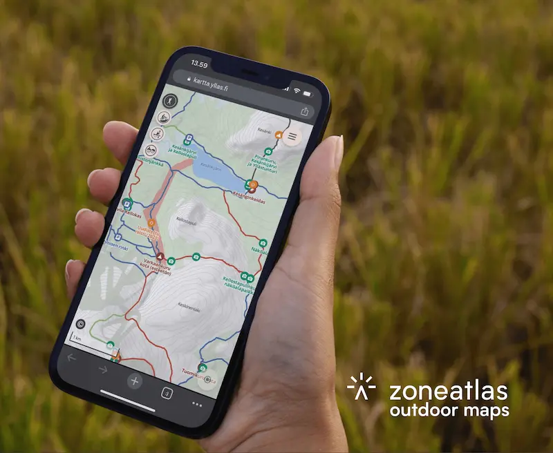 Zoneatlas outdoor maps solution on smartphone displaying hiking and cycling routes with interactive trail navigation in natural landscape